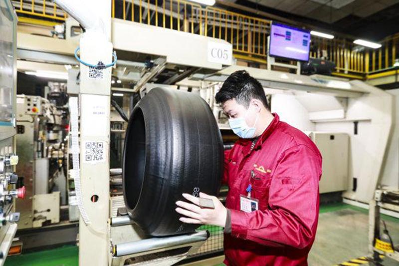The workers are ramping up the production of tires.